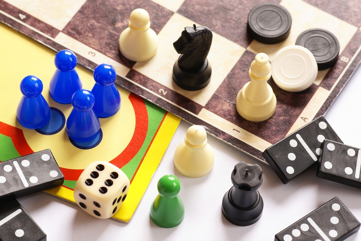 Board games, pawns, chessmen, dominoes and dice.